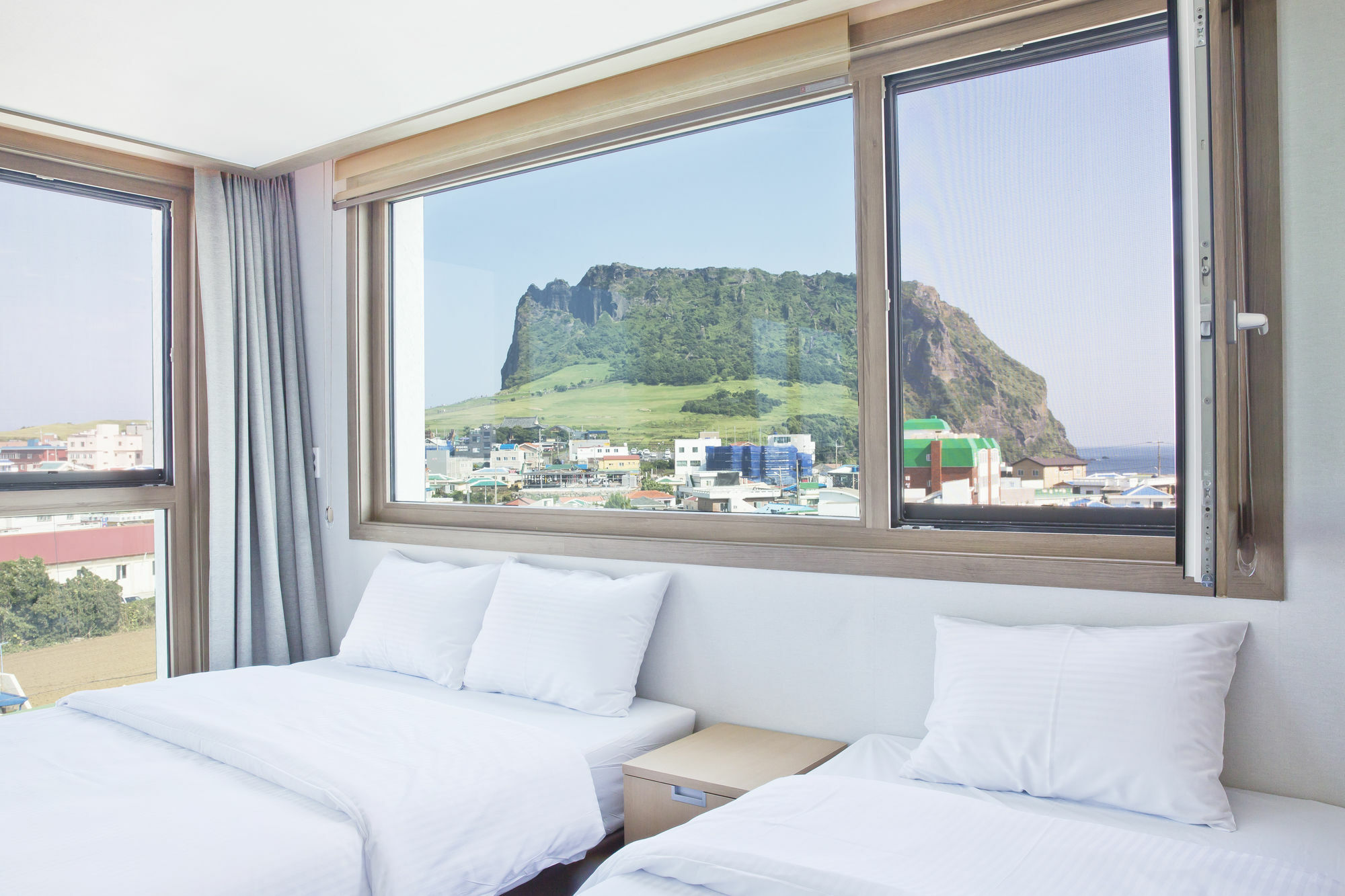 ซันไรส์ โฮเทล ซองซาน Hotel ซอกวีโพ ภายนอก รูปภาพ