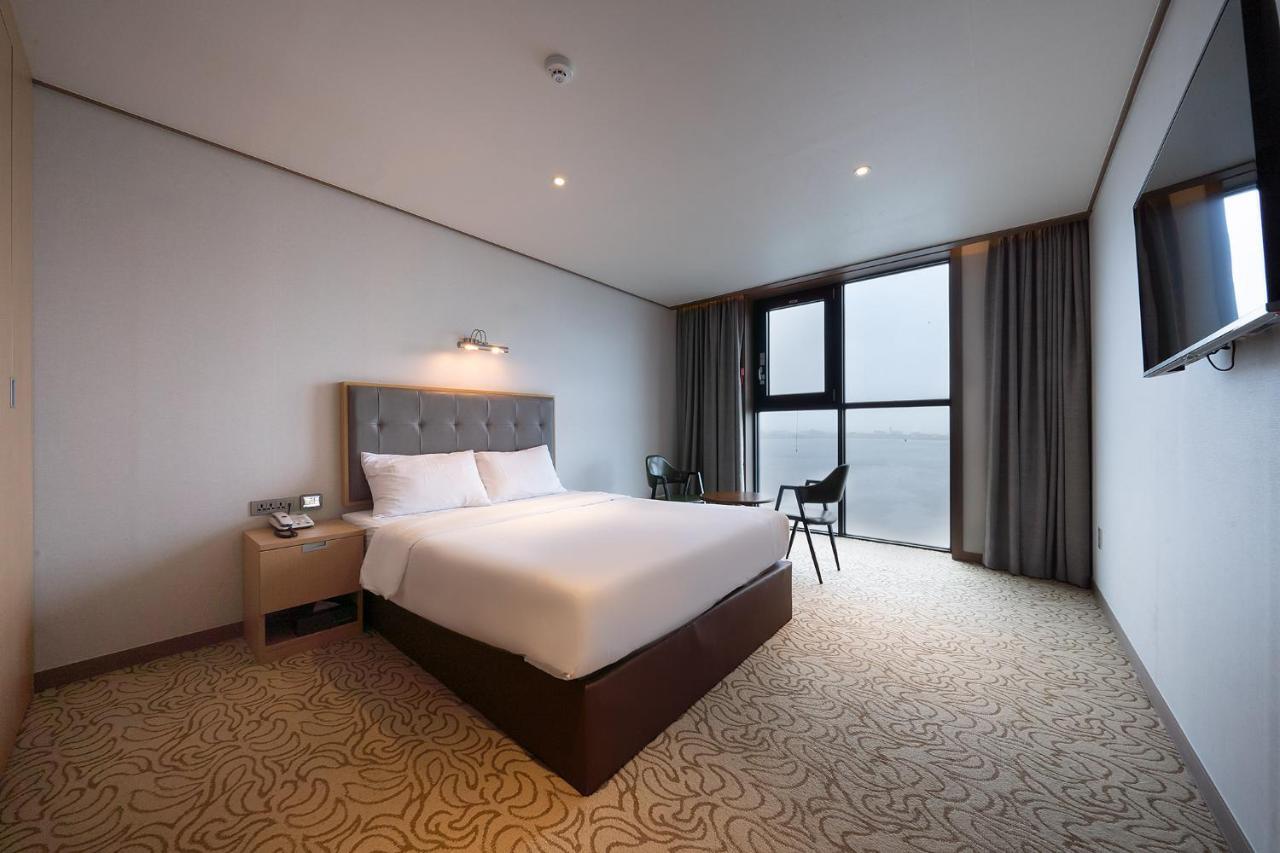 ซันไรส์ โฮเทล ซองซาน Hotel ซอกวีโพ ภายนอก รูปภาพ
